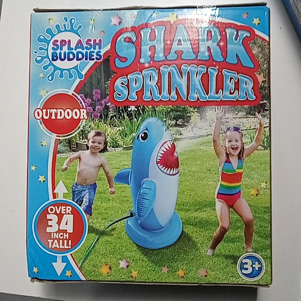 Splash buddies shark sprinkler